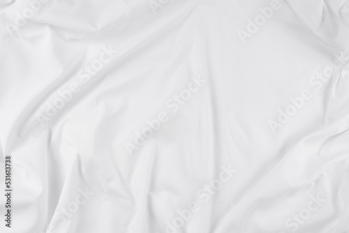 White fabric. luxurious white fabric texture background. Creases of satin, silk, and cotton.