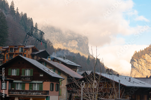 Lauterbrunnen , Picturesque villages , town and valleys of Alps . Nice Staubbach Falls , Kirche , nature during autumn, winter : Lauterbrunnen , Switzerland : December 3 , 2019