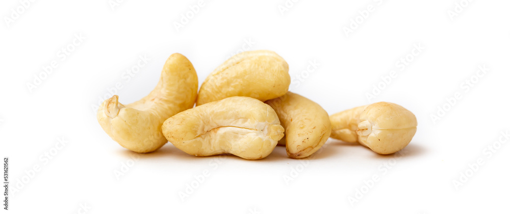 Cashew nuts as a background, top view. Cashew isolated on white background. Healthy foods. Cashew nuts as a background, top view. Cashew isolated on white background. Healthy foods.