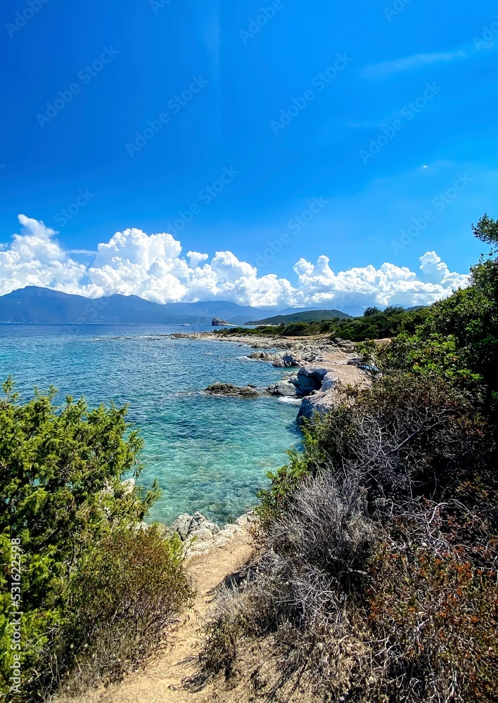 Fototapeta premium View from the path to the beautiful Saleccia beach (Plage de Saleccia) near Saint Florent. Beach with crystal clear sea water, Corsica, France.