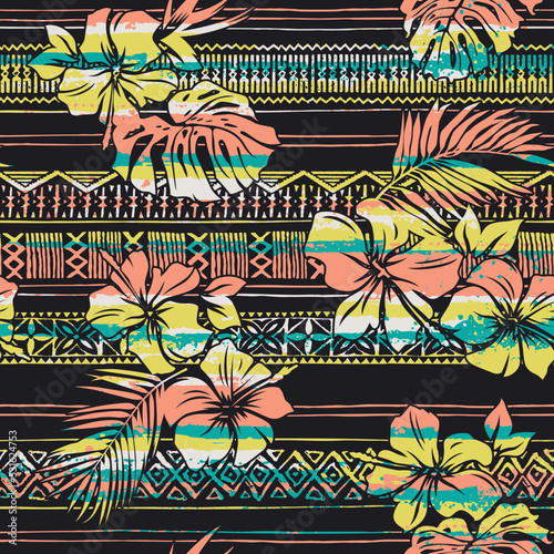 Hawaiian tribal elements and hibiscus flowers abstract grunge vintage vector seamless pattern