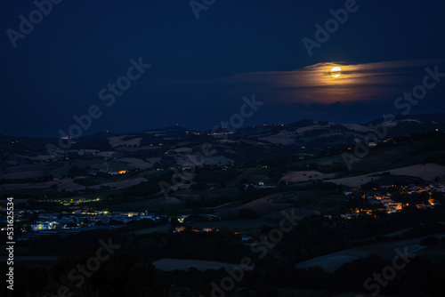 The Moon at night over the Foglia valley under Belvedere Fogliense