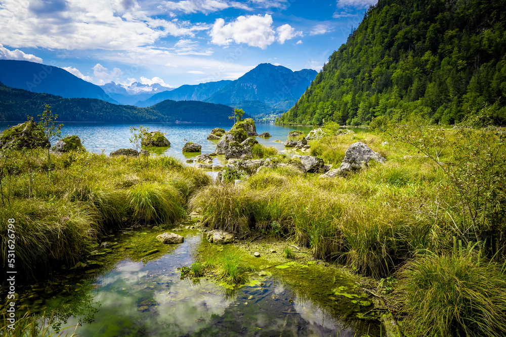 Breathtaking view of the alpine Altausseer See (Lake Aussee) in Ausseer Land region, Styria, Austria, with the Dachstein glacier in the background