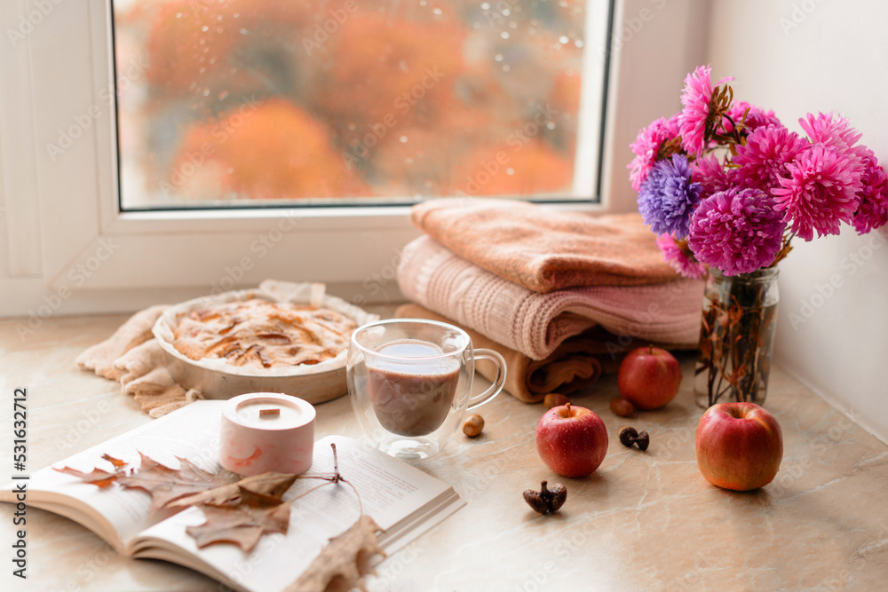 Homemade apple pie on a white background near the window close-up and copy space Homemade apple pie on a white background near the window close-up and copy space