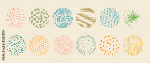 Set of round abstract colored hand drawn doodle shapes. Backgrounds in the form of a circle of spots, lines, splashes, curves, stripes and dots.