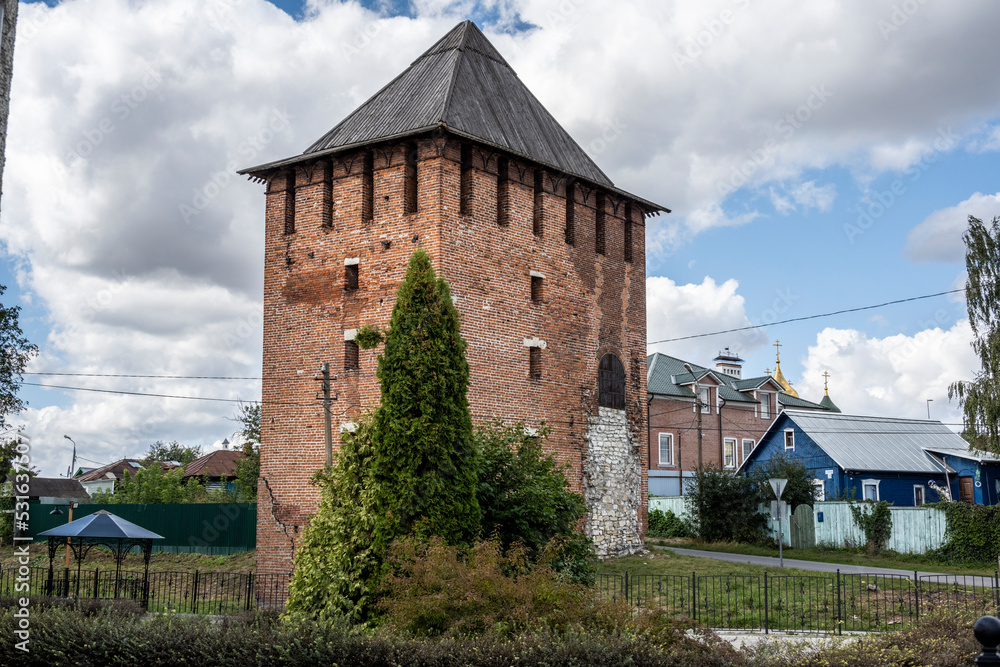 landscape with historical fragments of the brick red Kremlin of the city of Kolomna