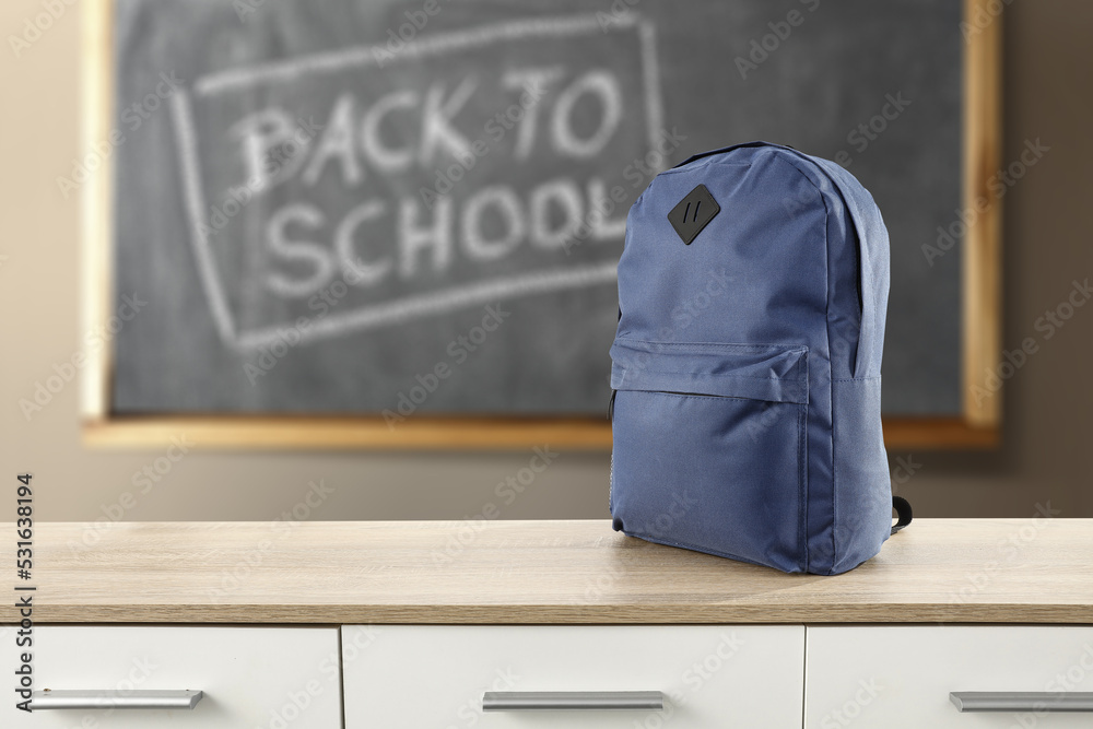 Desk of free space and school interior with school backpack. Desk of free space and school interior with school backpack.