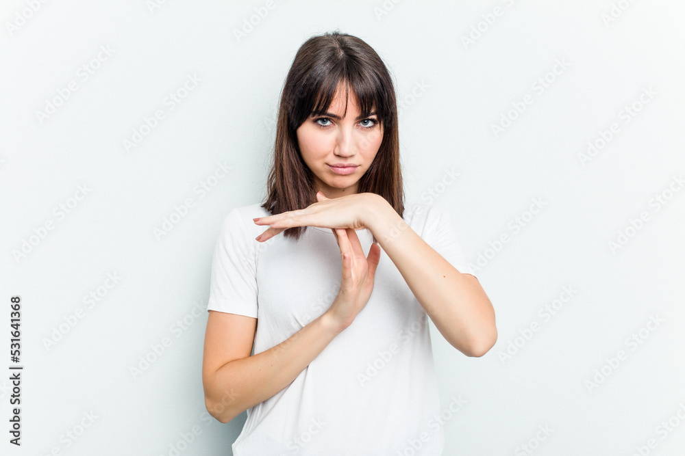 Young caucasian woman isolated on white background showing a timeout gesture. Young caucasian woman isolated on white background showing a timeout gesture.