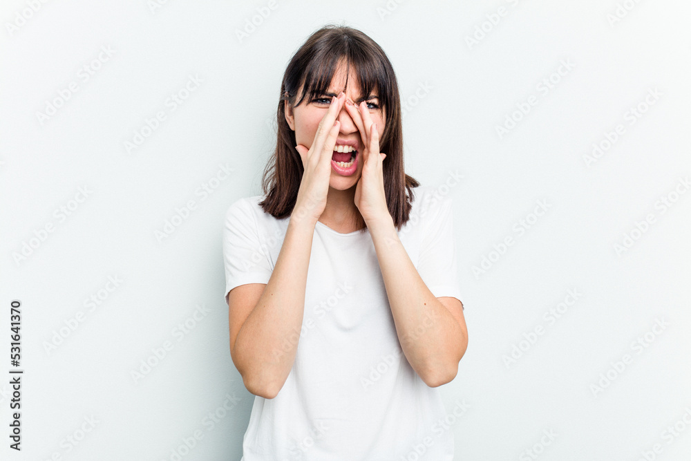 Young caucasian woman isolated on white background shouting excited to front. Young caucasian woman isolated on white background shouting excited to front.