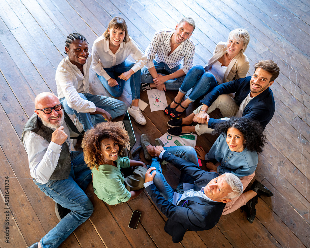 Creative business people having a team building session, mixed age range  group of designer working together for strategy, smiling colleagues  teamwork Stock-Foto | Adobe Stock