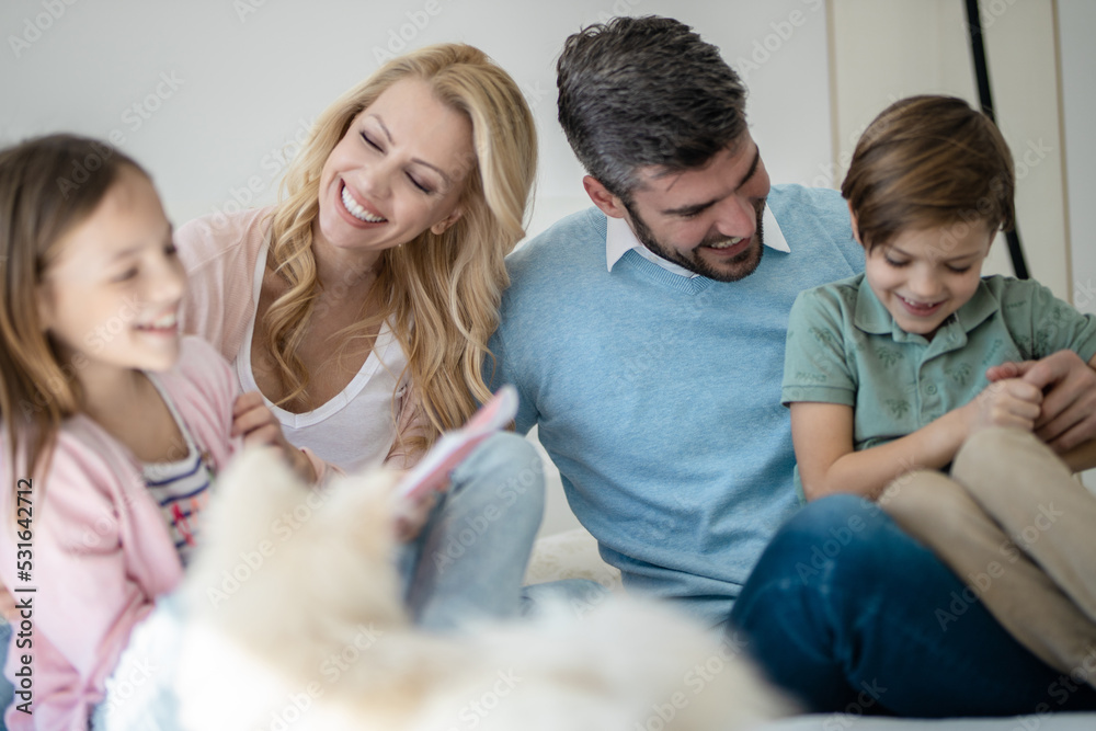 Portrait of happy family spending time together at home Portrait of happy family spending time together at home