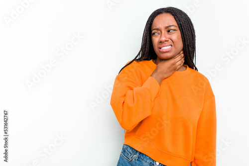 Young African American woman isolated on white background touching back of head, thinking and making a choice.