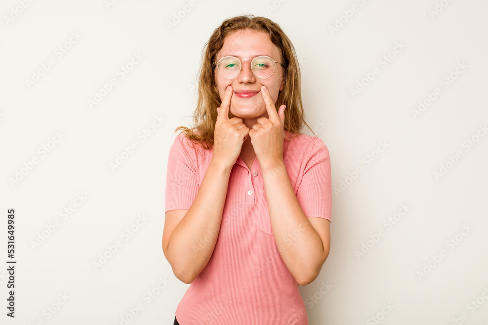Young caucasian woman isolated on white background doubting between two options. Young caucasian woman isolated on white background doubting between two options.