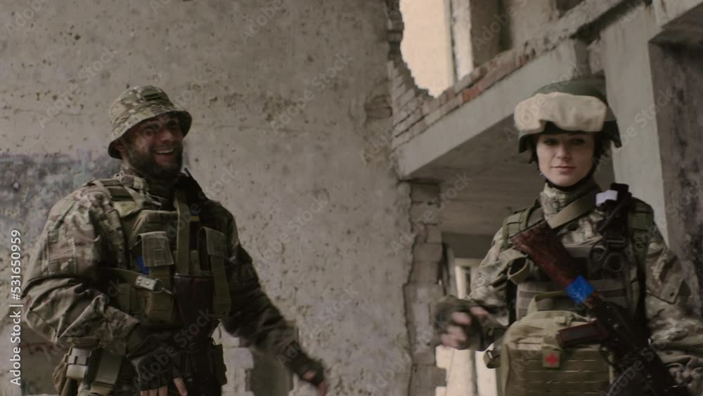 The Ukrainian military is defending its positions. Brothers in arms man and woman at war.