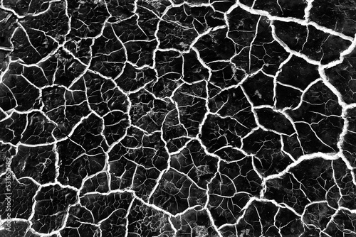 black background cracks white texture desert effect abstract