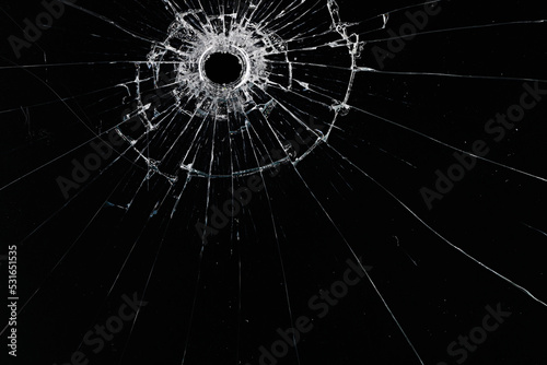 bullet hole on glass black background for overlay, transparent window