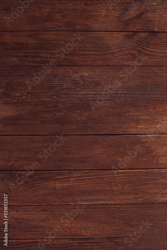 Fototapeta Naklejka Na Ścianę i Meble -  Vintage brown wood background texture with knots and nail holes. Old painted wood wall. Brown abstract background. Vintage wooden dark horizontal boards. Front view with copy space. Background for des