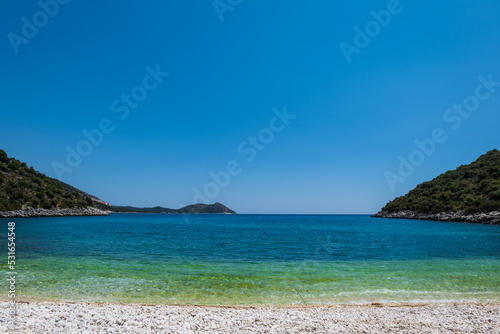 Beautiful seascape of Mediterranean Sea with hills and mountains on the horizon. Shot on Lycian way hiking trail near Antalya, Turkey