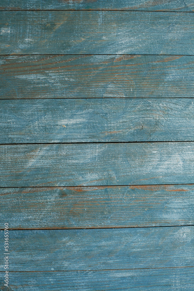 Fototapeta premium Vintage blue wood background texture with knots and nail holes. Old painted wood wall. Blue abstract background. Vintage wooden dark blue horizontal boards. Front view with copy space. 