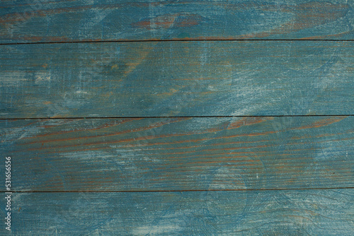  Vintage blue wood background texture with knots and nail holes. Old painted wood wall. Blue abstract background. Vintage wooden dark blue horizontal boards. Front view with copy space. 