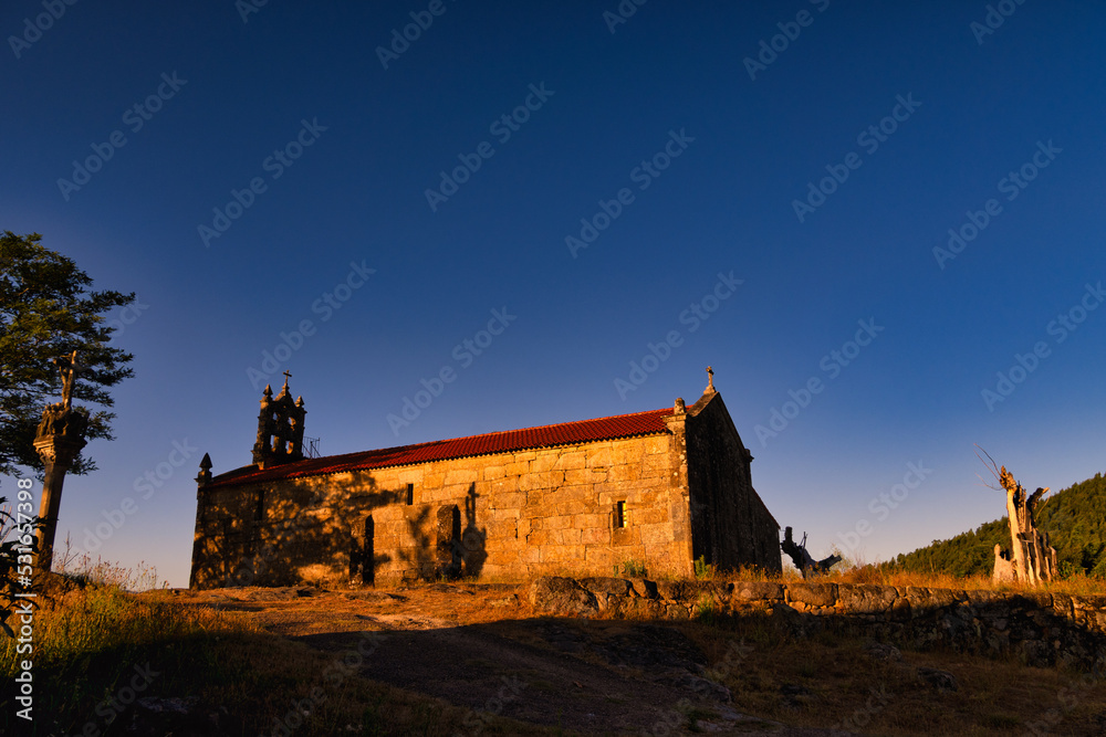 Sunset over the chapel of the sweet name of Jesus, near Ponteareas, Galicia, Spain.