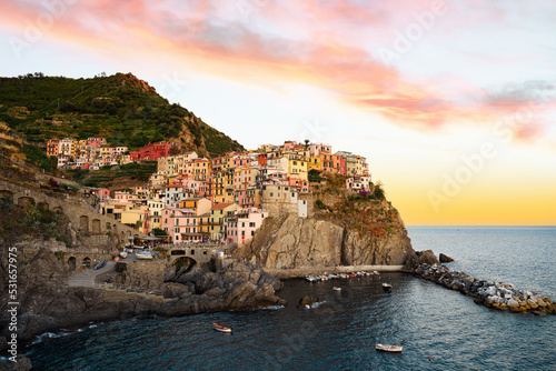 Stunning view of Manarola, the second village of the Cinque Terre coming from La Spezia. Manarola is the most picturesque village, made up of colorful tower-houses. La Soezia, Liguria, Italy..