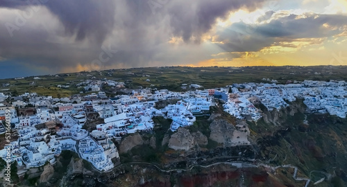 Aerial view of Subeam in Santorini, Greece. Picture square view of sunset sky scene traditional cycladic Santorini houses background