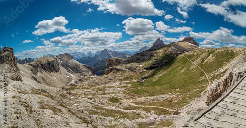 Panoramic hiking trail along the Tirol Sexten mountain chain during summer time