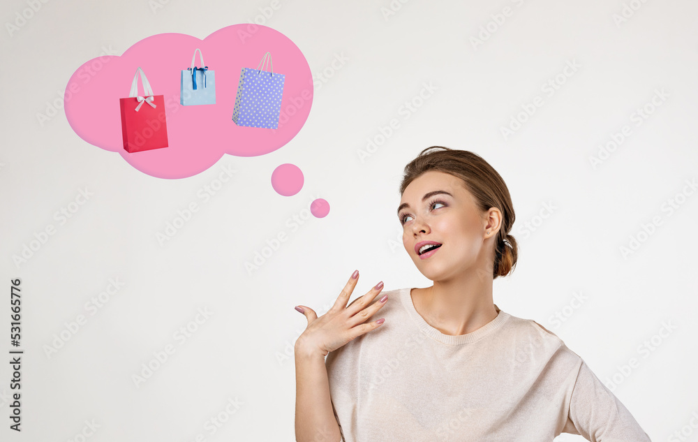 beautiful young woman thinks about shopping beautiful young woman thinks about shopping