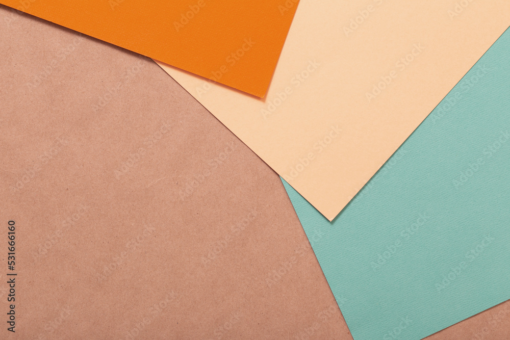 multi-colored paper background from several sheets of cardboard