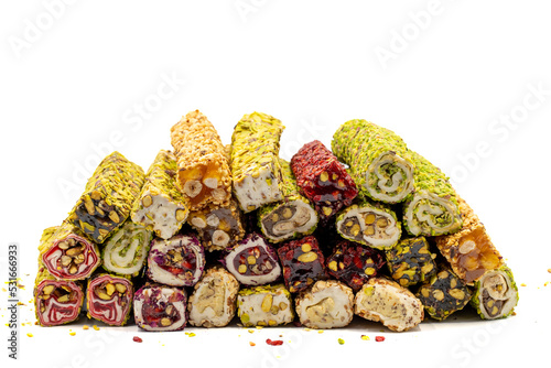 Assortment of Turkish delight with pistachio isolated on white background. Mixed Turkish Delight. Close-up. local name fistikli fitil lokum