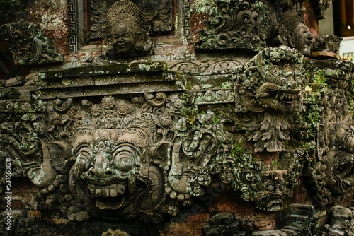 Tela A traditional demons carved in stone on the island of Bali, Indonesia