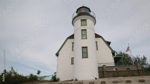 Wallpaper Mural Historic Point Betsie Lighthouse in Frankfort, Michigan along Lake Michigan with gimbal video panning left to right. Torontodigital.ca