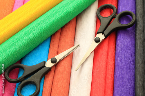 colorful crepe paper sheets and scissors