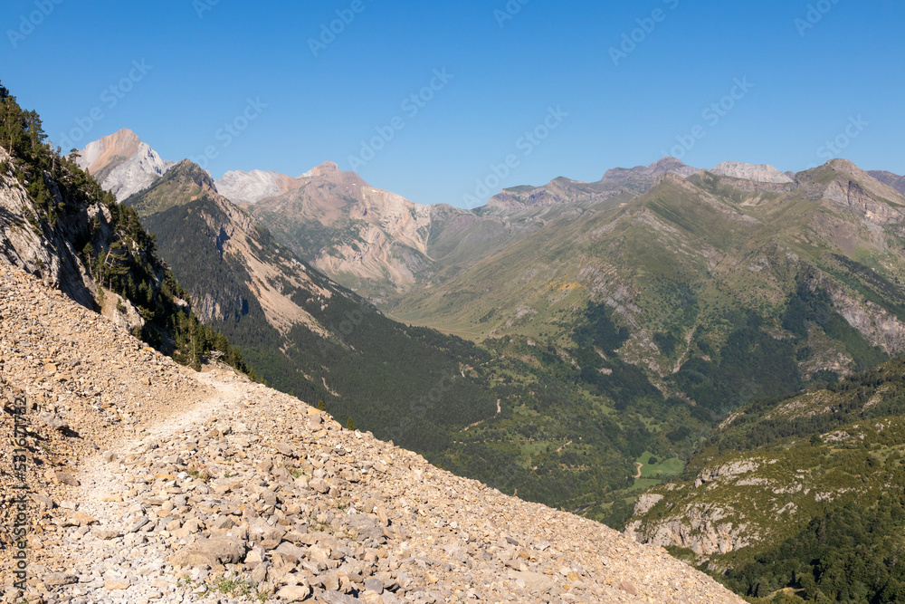 Mountainous landscape with hiking and views of the beautiful mountains on a sunny day. Mountain travel and summer vacation concept