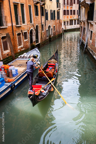 People enjoying gondola ride in Venice, Italy © Nino Pavisic