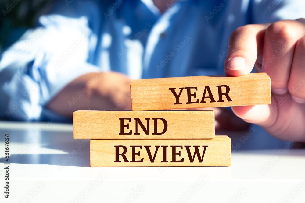 Wooden blocks with words 'Year End Review'. Wooden blocks with words 'Year End Review'.