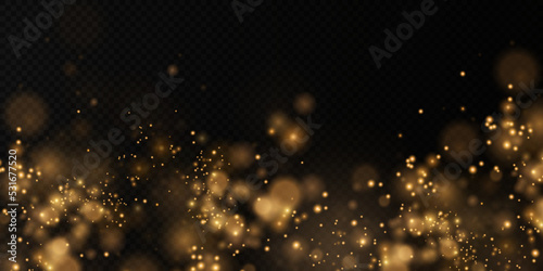 Gold sparkling dust with gold sparkling stars on a transparent background.Glittering texture. Christmas effect for luxury greeting rich card. Gold dust PNG.