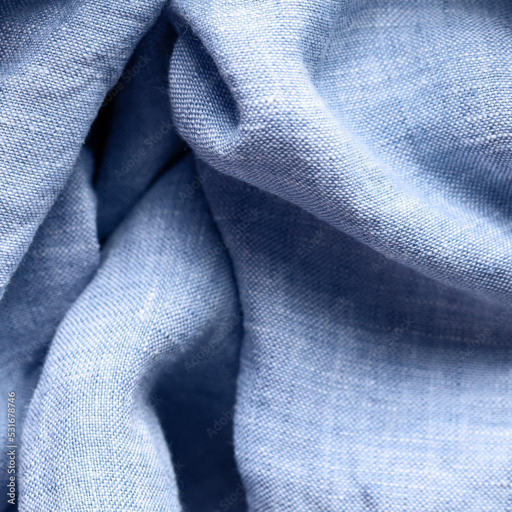 Fototapeta premium Indigo linen fabric texture for sustainable fashion background. Eco friendly fabric
