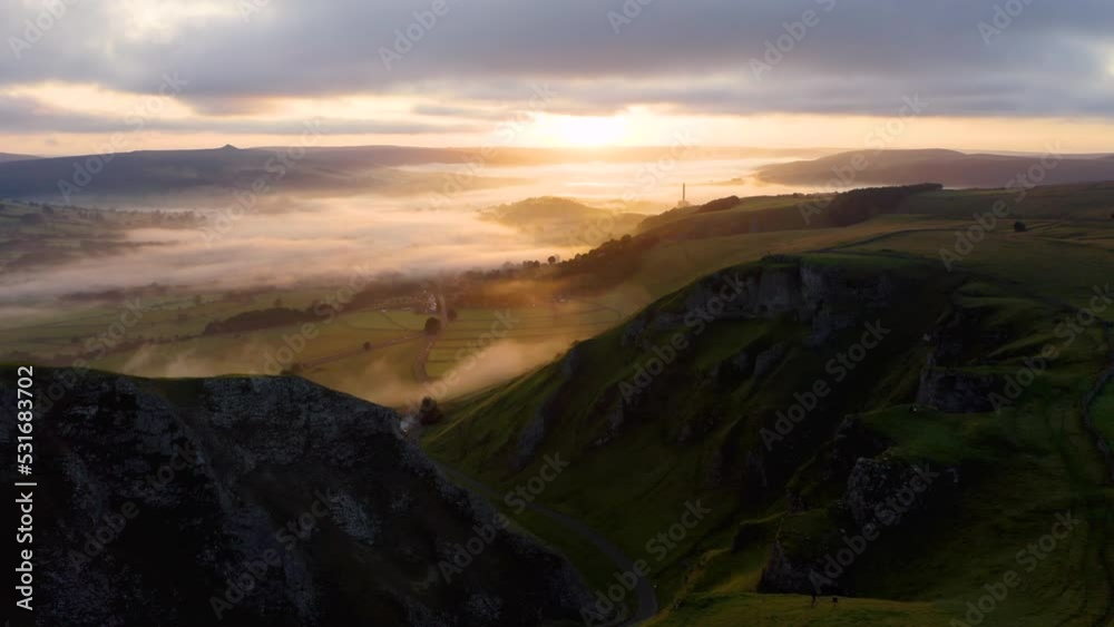 Drone view, Winnats Pass, Peak District National Park, Derbyshire, England. Peak District National Park - aerial view over Winnats Pass. Winnats pass road. Hope Valley, Derbyshire, England, UK, Europe Drone view, Winnats Pass, Peak District National Park, Derbyshire, England. Peak District National Park - aerial view over Winnats Pass. Winnats pass road. Hope Valley, Derbyshire, England, UK, Europe