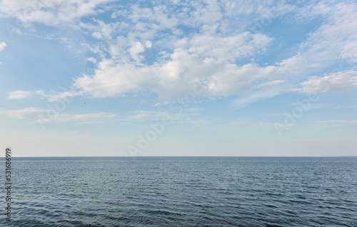 Baltic sea shore on a sunny day. Clear blue sky and water. Idyllic summer seascape, landscape. Pure nature, ecology, eco tourism, vacations. Panoramic view