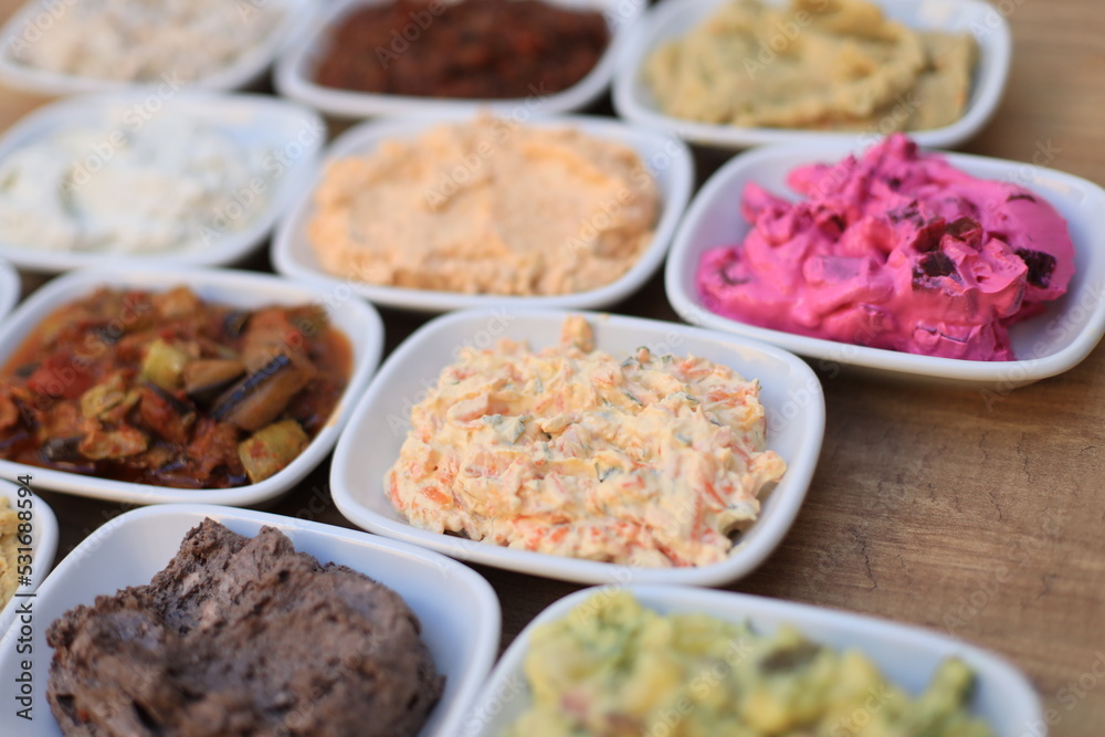 Meze or mezze is a selection of small dishes served as appetizers in much of West Asia, Middle East, and the Balkans. Meze is often served as a part of multi-course meals.
Meze or mezze is a selection of small dishes served as appetizers in much of West Asia, Middle East, and the Balkans. Meze is often served as a part of multi-course meals.