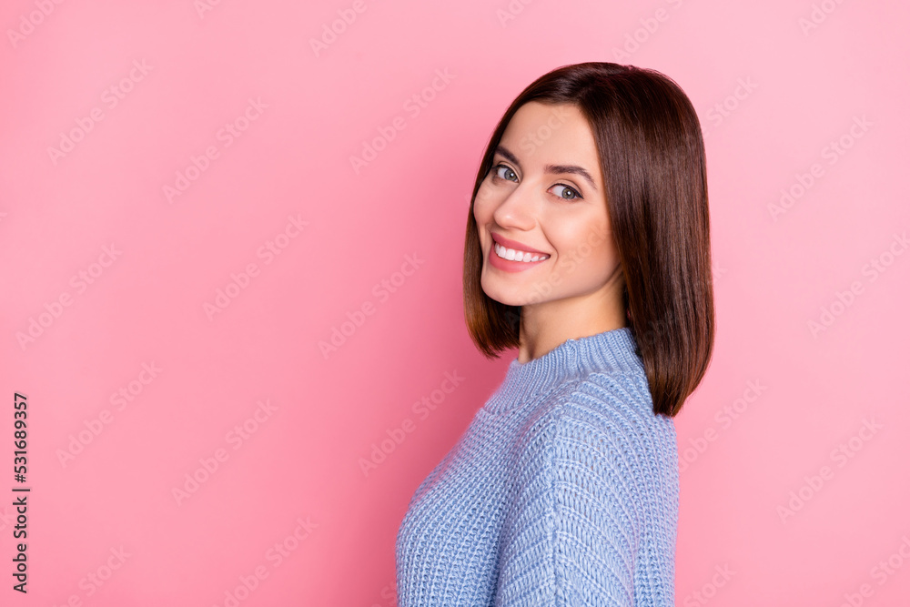 Fototapeta premium Profile portrait of pretty positive person beaming smile empty space isolated on pink color background