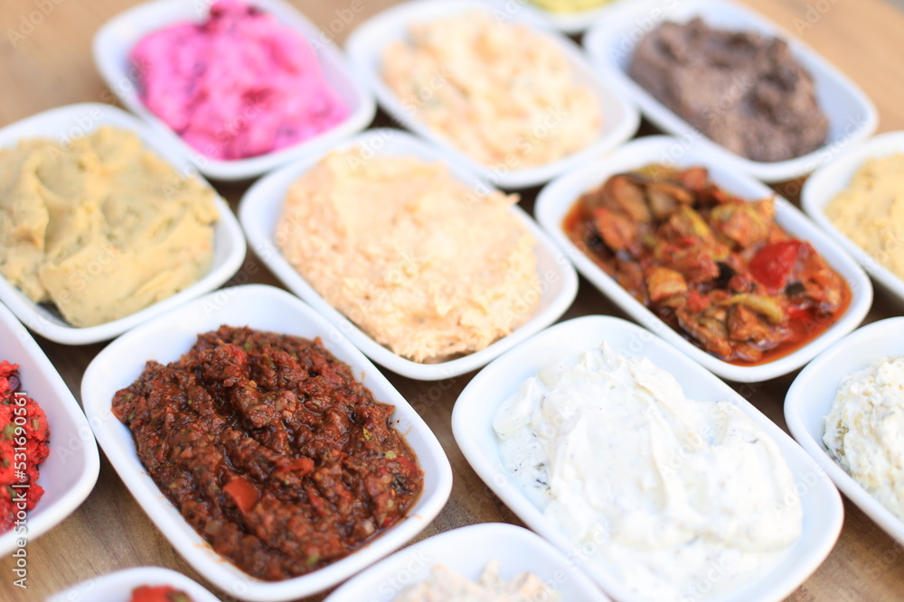 Meze or mezze is a selection of small dishes served as appetizers in much of West Asia, Middle East, and the Balkans. Meze is often served as a part of multi-course meals.
Meze or mezze is a selection of small dishes served as appetizers in much of West Asia, Middle East, and the Balkans. Meze is often served as a part of multi-course meals.