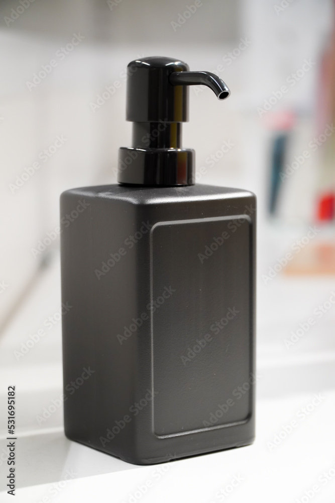 black bottle of hand sanitizer white background black bottle of hand sanitizer white background