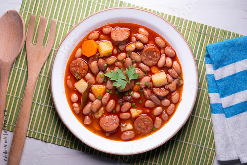 Asturian bean stew. Traditional recipe from the north of Spain with broad beans and chorizo.