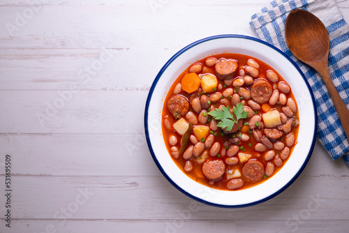 Asturian bean stew. Traditional recipe from the north of Spain with broad beans and chorizo.