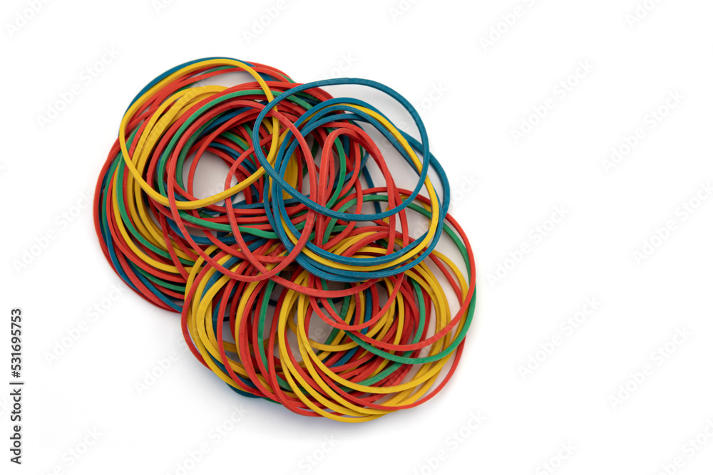 pile of colored rubber bands isolated on white, stationery pile of colored rubber bands isolated on white, stationery