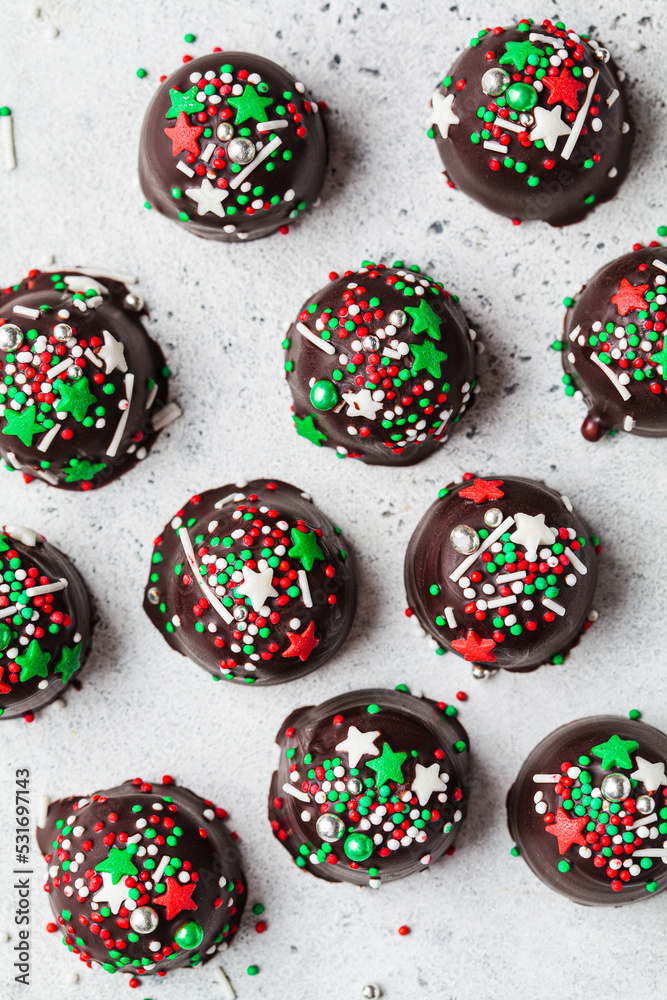 Christmas handmade chocolate balls with holiday sprinkles. DIY holiday gift.