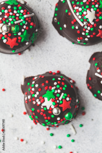 Christmas handmade chocolate balls with holiday sprinkles. DIY holiday gift. © vaaseenaa